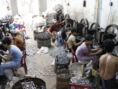 This is an image of  a sweatshop in china that still occurs today